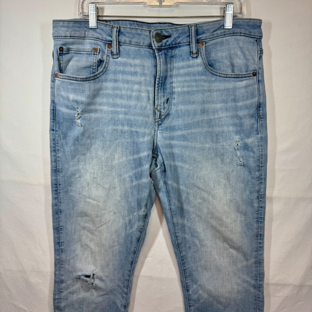 American Eagle AirFlex Temp‎ Tech Distressed Light Wash Jeans Sz 34x34